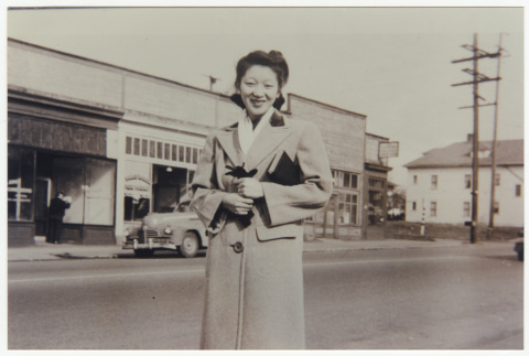 Tamako Tokuda standing on sidewalk (ddr-densho-383-473)