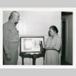 Woman receiving medal (ddr-densho-1007-312)