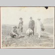 A family gathering shellfish on a beach (ddr-densho-278-100)