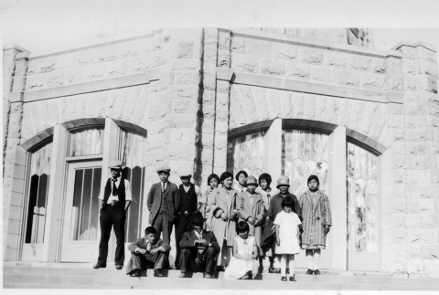 Group standing in front of building (ddr-densho-134-16)