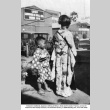 Girl and boy in traditional Japanese clothing (ddr-ajah-6-425)