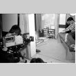 BTS shot of filming Brian Yamakoshi playing koto (ddr-densho-1007-1326)