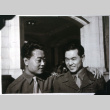 Two men in front of archway (ddr-densho-1007-706)