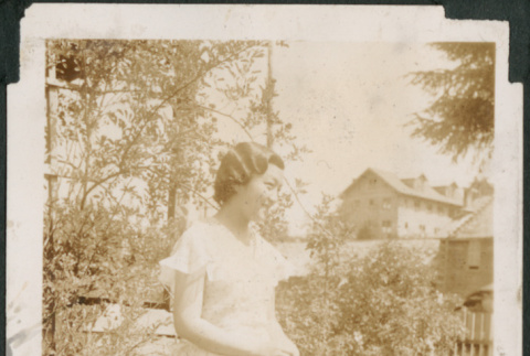 Woman standing in yard (ddr-densho-316-206)