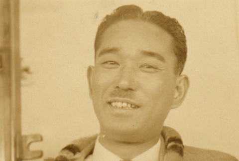 Japanese writer wearing a lei (ddr-njpa-4-1844)
