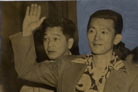 Chuck Mau and a man raising his hand (ddr-njpa-2-683)