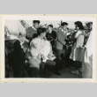 Navy and White girls presenting gifts (ddr-densho-37-1499)