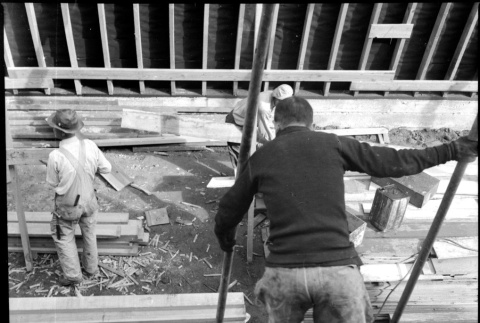 Men installing boiler (ddr-densho-426-2166)