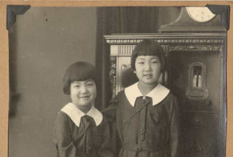 Two girls in matching outfits (ddr-densho-542-174)