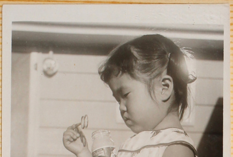 Leslie Shiomi with bubbles (ddr-densho-522-543)