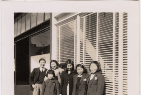 Group standing outside business (ddr-densho-426-33)