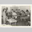 Women's auxiliary group having a class (ddr-jamsj-1-593)