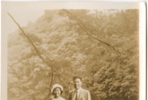 Man and woman standing by river (ddr-densho-426-1529)