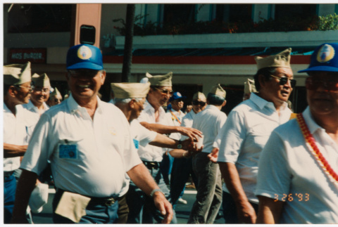 Veterans marching in parade (ddr-densho-368-425)