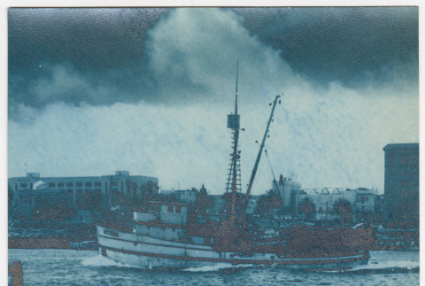 View of a boat from behind a chain (ddr-densho-542-848)