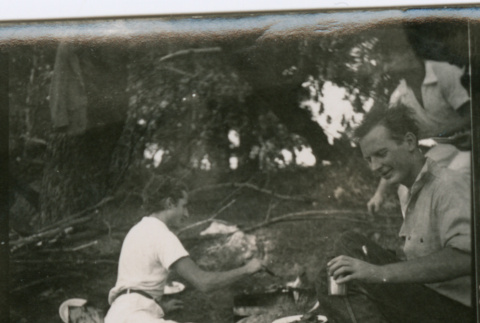 Picnickers grilling in the woods (ddr-densho-329-722)