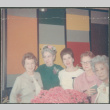 Five women by colorful wall (ddr-densho-523-459)
