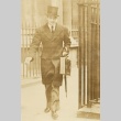Anthony Eden walking with briefcase and umbrella (ddr-njpa-1-251)