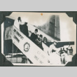 Men walking down stairs from plane (ddr-ajah-2-713)
