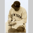 Babe Ruth autographing or writing in a book (ddr-njpa-1-1384)