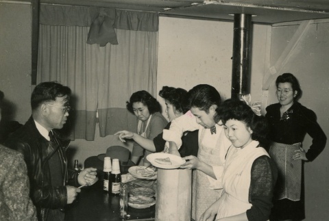 Party for silk screen shop workers (ddr-densho-159-222)