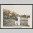 three men outside (ddr-densho-378-595)