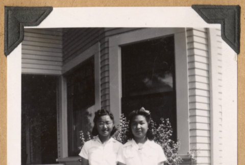 Two girls hand in hand (ddr-densho-542-227)