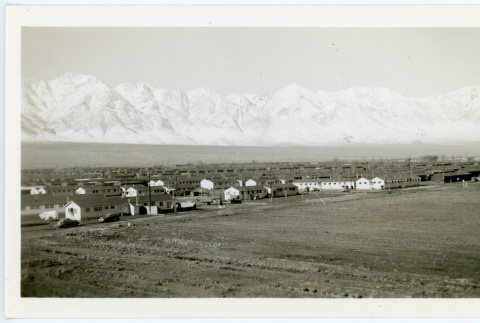 Photograph of Manzanar with mountains in the background (ddr-csujad-47-339)