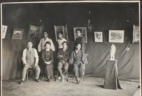 A group posing at an art exhibit (ddr-densho-278-111)