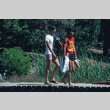 Stan Morita and Rick Iwai walking on the dock (ddr-densho-336-1135)