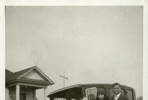 Family in front of car (ddr-densho-182-50)