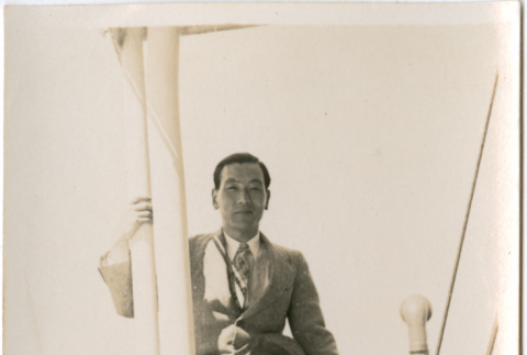Man seated on railing of S.S. Taiyo Maru (ddr-densho-426-1545)