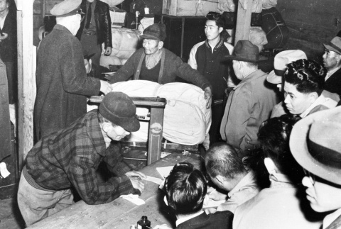 Japanese Americans with baggage (ddr-densho-37-114)