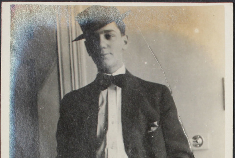 Man in bow tie and hat (ddr-densho-355-642)