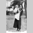 Woman holding baby (ddr-ajah-3-223)