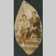 Two men sitting on steps (ddr-densho-316-314)