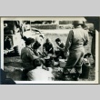 442nd soldiers cooking C rations (ddr-densho-22-31)