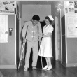 Nurse and patient on crutches (ddr-densho-1007-463)