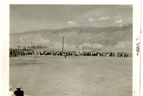 Photograph of baseball game at Manzanar (view from outfield bleachers) (ddr-csujad-47-46)
