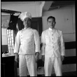 Cook and crew member on board ship (ddr-densho-426-262)