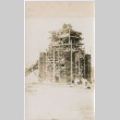Large structure, men in foreground (ddr-densho-329-1368)