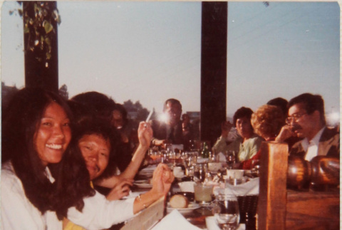Group sitting at a table (ddr-densho-426-1312)