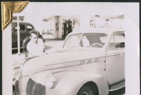 Man standing by car (ddr-densho-434-131)