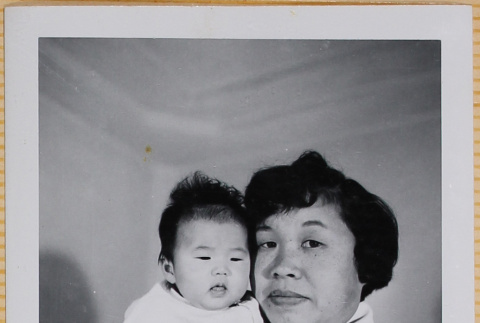 Yoshiko Shiomi holding Leslie Shiomi (ddr-densho-522-357)