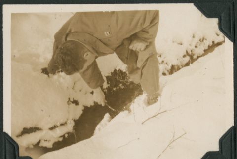 Soldier collecting soil sample (ddr-densho-397-181)