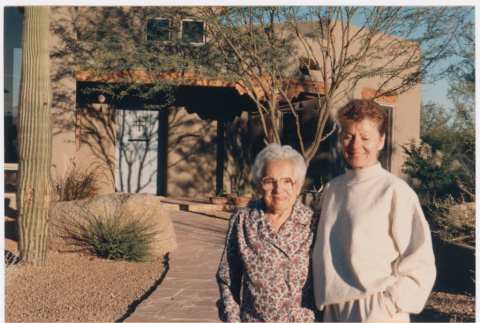Two women outside a house (ddr-densho-377-1695)