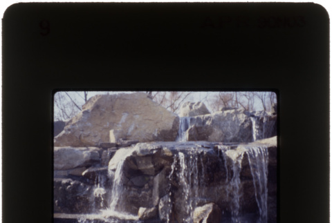 Waterfall and pool at the Paredes project (ddr-densho-377-551)