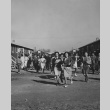 High school students changing classes at Rohwer incarceration camp (ddr-csujad-14-62)