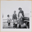 Yoshiko, William, Susan and Leslie Shiomi next to car (ddr-densho-522-555)