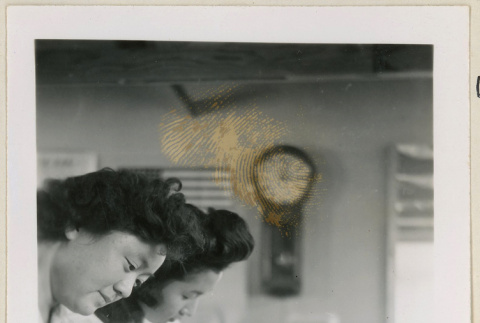 Women writing at a desk (ddr-densho-37-1004)